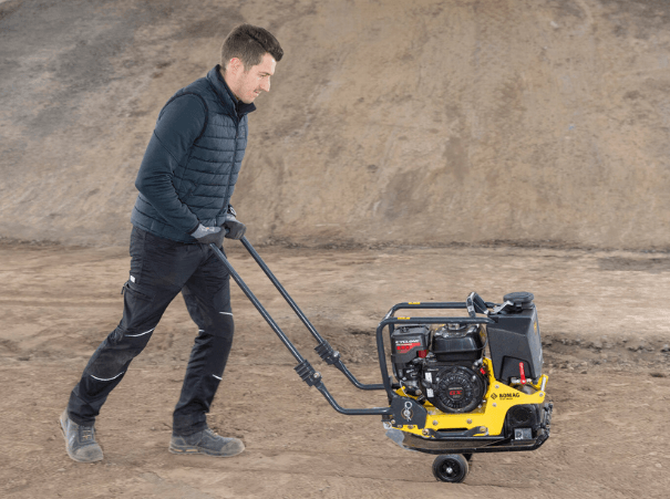 BOMAG BP 15_40 plate compactor with wheel kit being transported BOMAG BP 15_40 plate compactor with wheel kit being transported