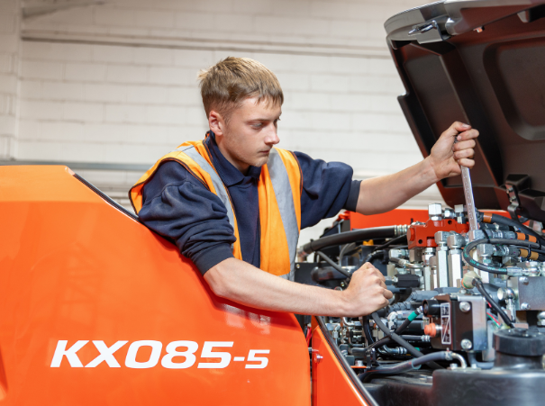Kubota KX085 with engineer servicing