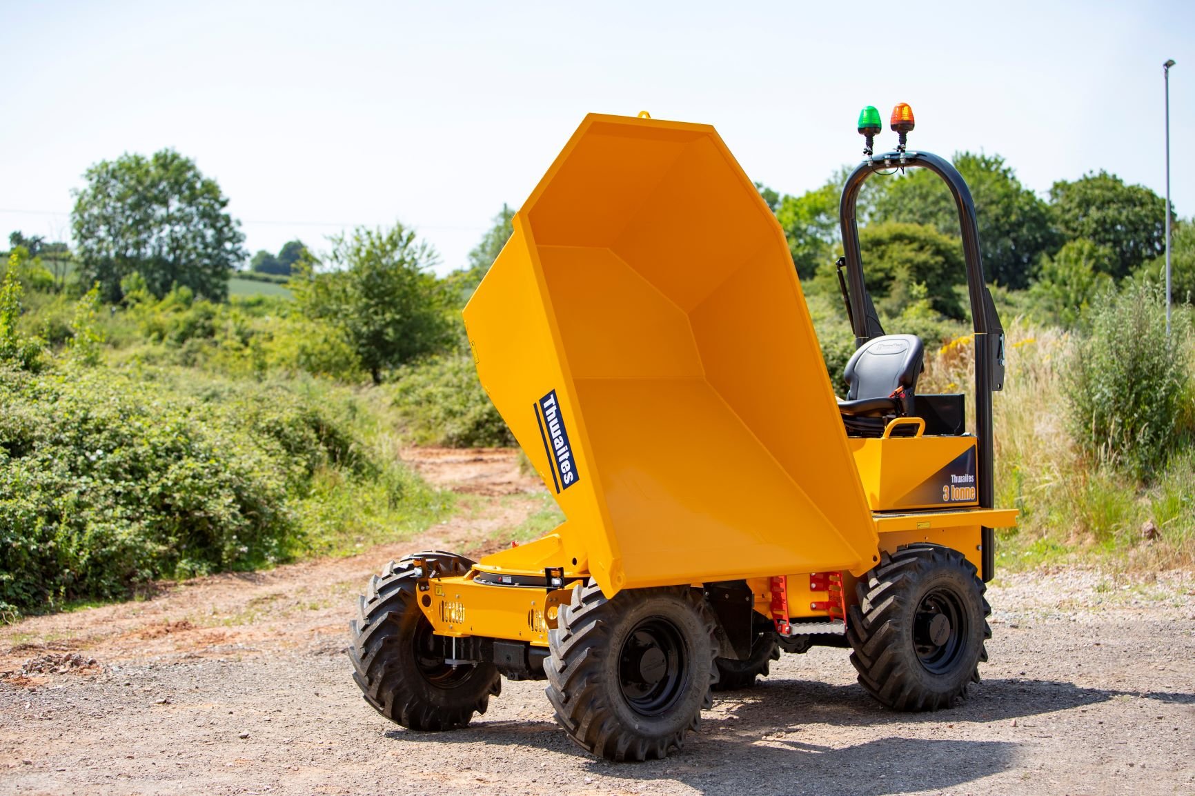 Thwaites 3 tonne dumper power swivel, skip is fully swivelled and tipped