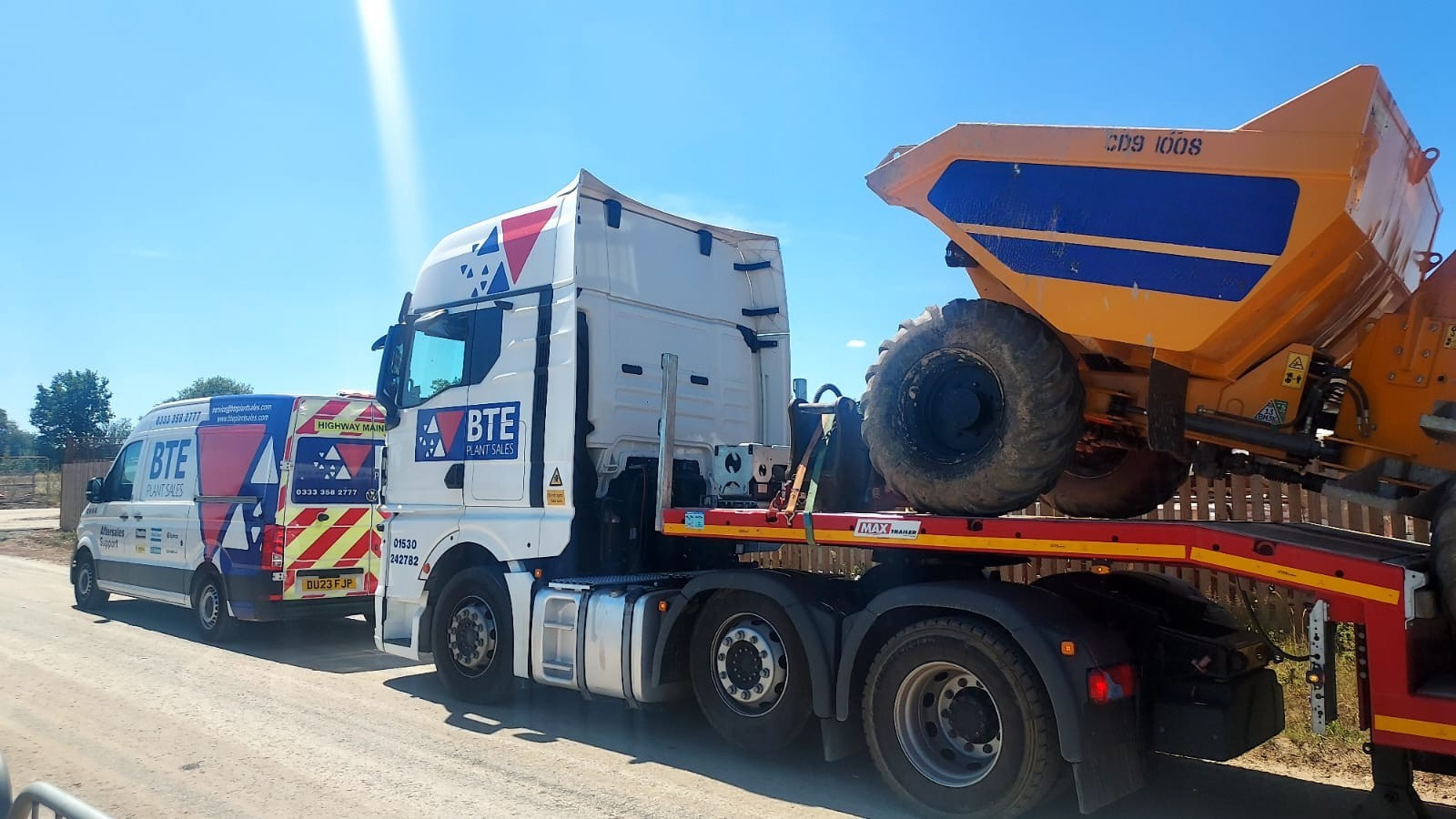 BTE service van on site with the BTE low loader that has a Thwaites dumper loaded on the back