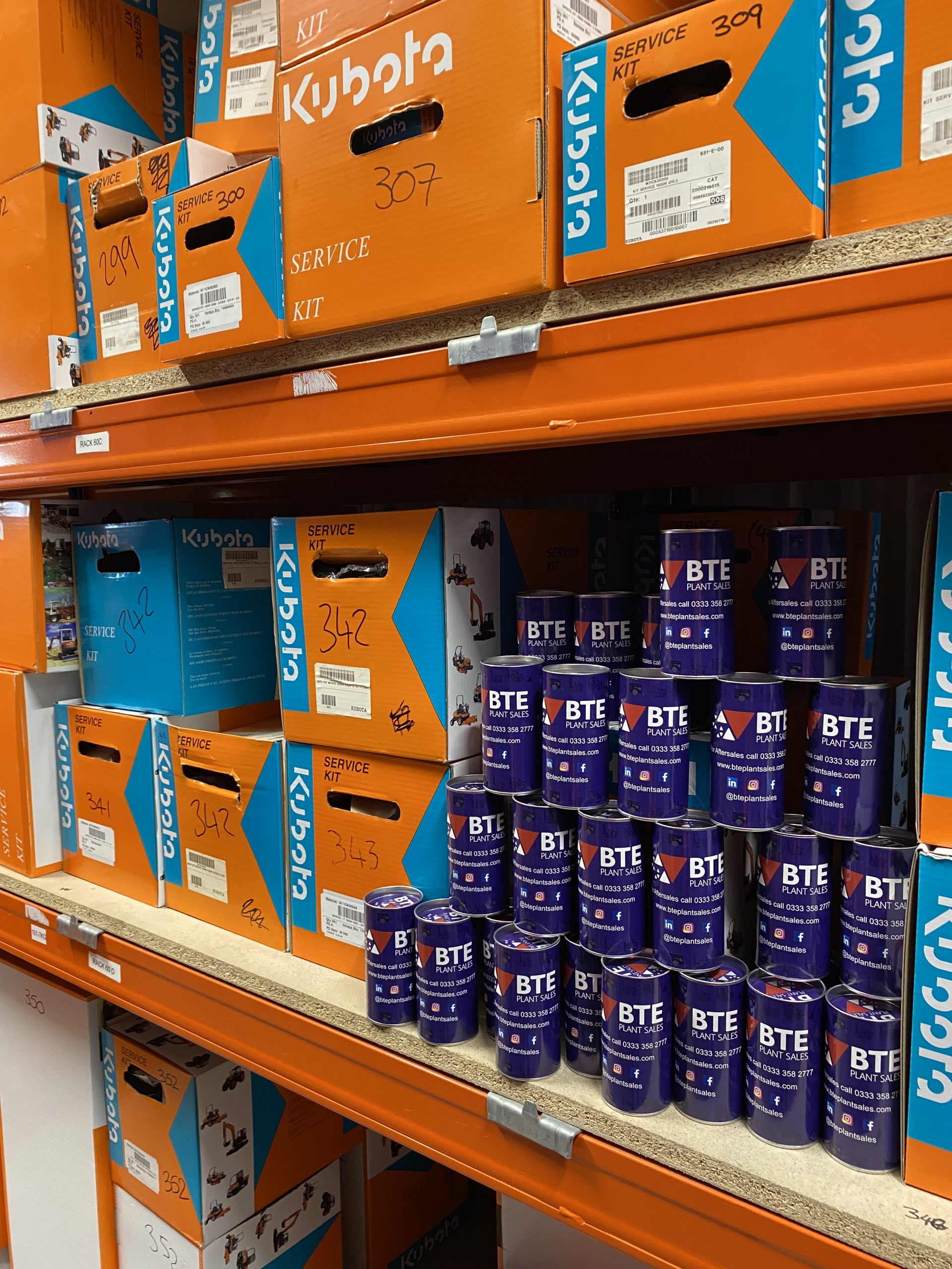 shelf at BTE with Kubota service kits and biscuits 